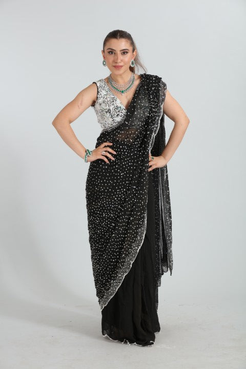 Layla Noor  Heavily embroidered blouse with embroidered drape saree