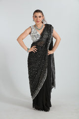 Layla Noor  Heavily embroidered blouse with embroidered drape saree