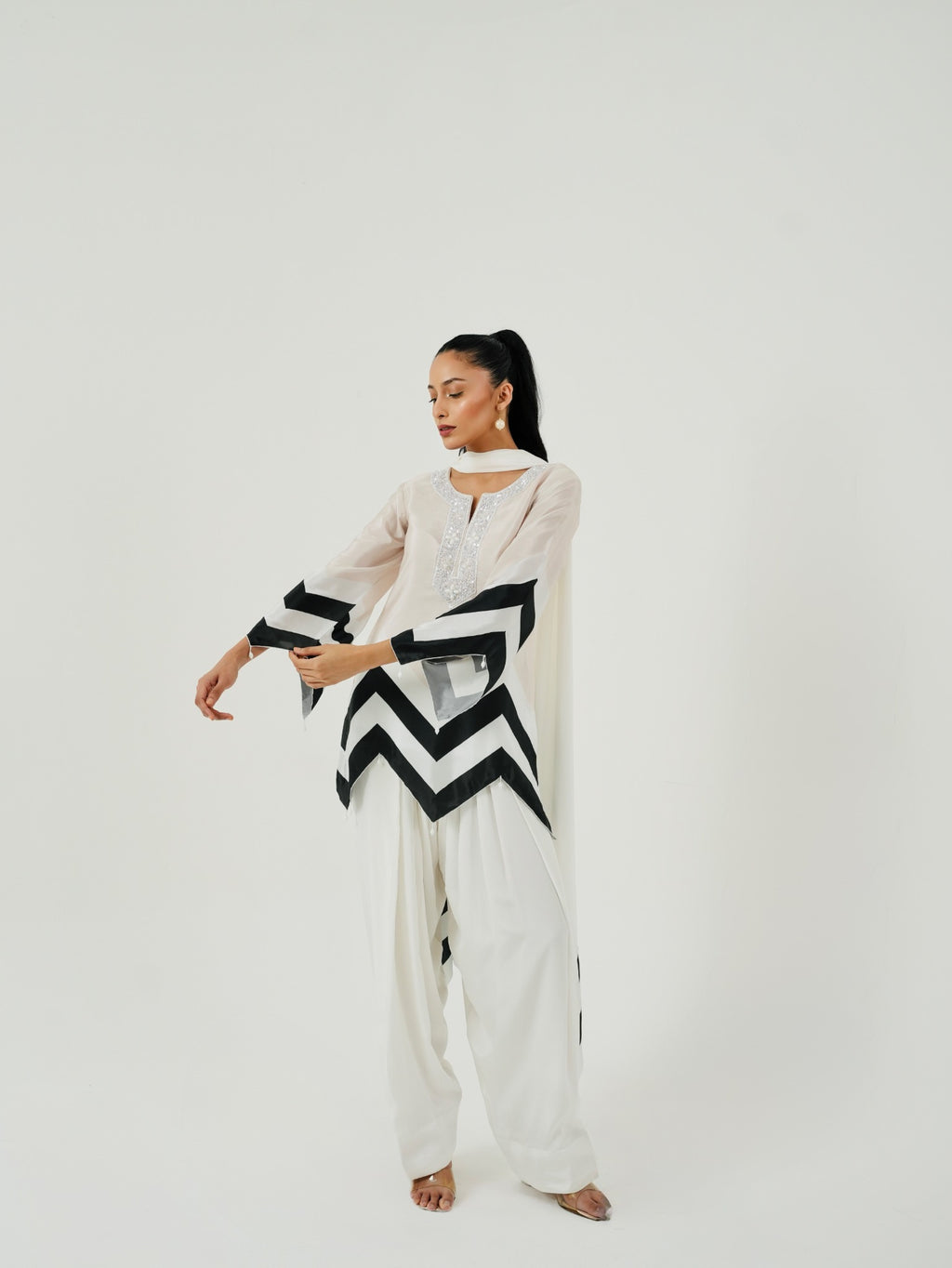 Full look of Ivory Chevron kurta with white Farshi salwar
