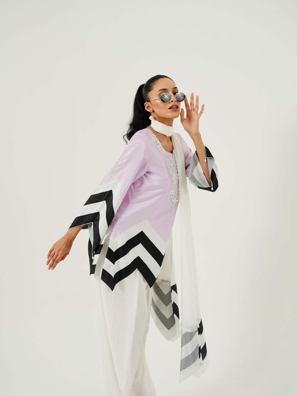 Full look of Lavender Chevron kurta with white Farshi salwar