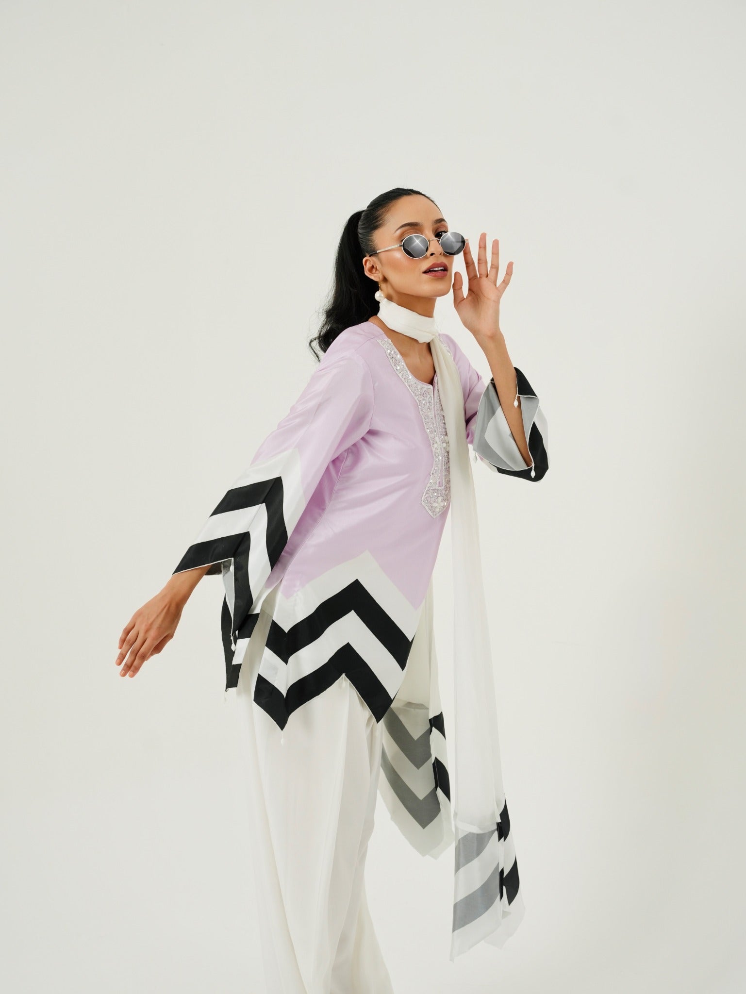 Full look of Lavender Chevron kurta with white Farshi salwar