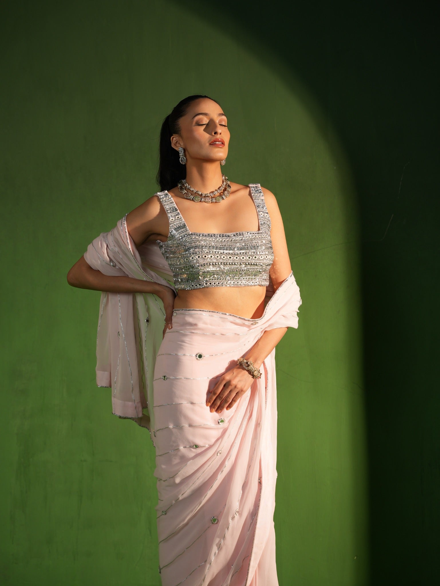 Powder pink saree with silver hand embroidered blouse detail